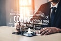 Person in Suit Using Tablet for Coding with Overlapping Text Elements about Data Structure, Testing, and Source Code on Royalty Free Stock Photo
