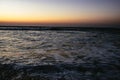 Person surfing at sunset at Sidi Kaouki Royalty Free Stock Photo