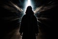 person, surrounded by dark and mysterious forces, with light shining through Royalty Free Stock Photo