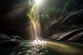 person, swimming in the pool at the base of dramatic waterfall, with sun shining through Royalty Free Stock Photo