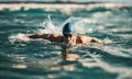 person swimming in the pool. swimming on the beach with jumps and breaststroke