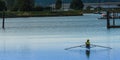 Person in rowing skull taking a break