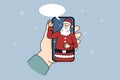 Person talk on video call with Santa Claus