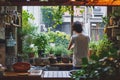 A person tending to a tiny garden outside their small living space