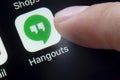 A person about to use the Google Hangouts app which is a communication software Royalty Free Stock Photo