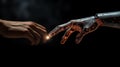 a person touching the hand of an android, in front of a dark background