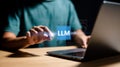 Person touching LM text on a laptop screen with digital interface finger computer Royalty Free Stock Photo