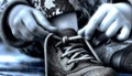 Person Tying Shoe Laces Royalty Free Stock Photo