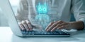 Person types on laptop with AI virtual assistant displayed. Human interacts with tech virtual assistant. Prompt engineering