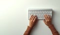 Person typing on computer keyboard overhead view with copy space Royalty Free Stock Photo