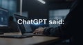 Person typing on laptop with Chat GPT text in a modern office setting Royalty Free Stock Photo