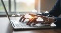 Person typing on a laptop with a cloud computing interface and glowing network connections overlay Royalty Free Stock Photo
