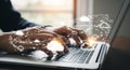 Person Typing on Laptop with Cloud Computing Network Overlay technology hands Royalty Free Stock Photo