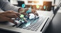 Person typing on laptop with digital data and cloud computing icons Royalty Free Stock Photo