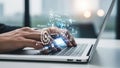 Person typing on laptop with glowing digital icons representing technology and data Royalty Free Stock Photo