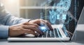 Person typing on laptop with glowing digital interface, representing data processing and technology Royalty Free Stock Photo