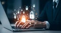 Person typing on laptop with glowing digital security locks and data streams cybersecurity Royalty Free Stock Photo