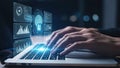 Person typing on laptop with glowing keyboard and holographic data interface, symbolizing digital security and technology Royalty Free Stock Photo