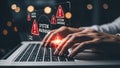 Person typing on laptop with system warning pop-ups Royalty Free Stock Photo