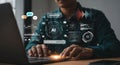 Man working on laptop with AI Assistant concept using digital interfaces and data analytics for business growth and innovation Royalty Free Stock Photo