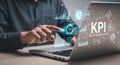 Person interacting with kpi dashboard on laptop with data visualizations and key performance indicators Royalty Free Stock Photo