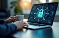Person uses laptop. Tech screen shows security features. Person holds coffee cup. Modern tech setting. Secure system. Tech