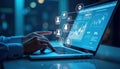 Person uses laptop to analyze website ranking, search engine optimization data. Businessperson examines digital charts, graphs