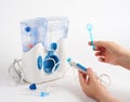 Person uses oral irrigator