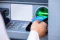 Person Using Card To Withdraw Money From ATM Machine Royalty Free Stock Photo