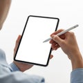 Person using digital tablet with stylus for creative work Royalty Free Stock Photo