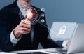 A person is using finger print authentication technology on a laptop computer. To gain access to a restricted system. Secure