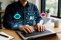 Person using a laptop with AI and data analytics holographic interface artificial intelligence visualization Royalty Free Stock Photo
