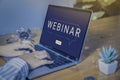 Person using a laptop computer for online training webinars. Royalty Free Stock Photo