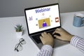 Person using a laptop computer for online training webinars. Royalty Free Stock Photo
