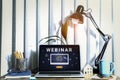 Person using a laptop computer for online training webinars. Royalty Free Stock Photo