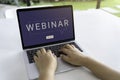 Person using a laptop computer for online training webinars. Royalty Free Stock Photo