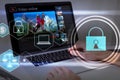 Person using a laptop computer with technology cybersecurity and privacy concept. protection and safe data for global