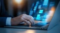 Person using a laptop with digital interface, close view on hands, modern technology concept Royalty Free Stock Photo