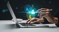 Person using laptop with glowing network icons for business and technology Royalty Free Stock Photo