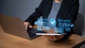 Person using laptop and tablet with digital approval workflow interface digital workflow Royalty Free Stock Photo