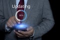 Person using smartphone installing update process for Improved functionality in the new version. Installing update concept on Royalty Free Stock Photo