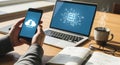 Person using smartphone and laptop for cloud data transfer work Royalty Free Stock Photo