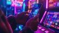 Person using smartphone to play online casino games with colorful slot machine background