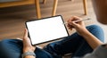 Person using stylus on blank tablet screen, creative work, digital art, modern technology concept Royalty Free Stock Photo