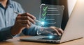 Person using stylus on digital checklist on transparent screen over laptop technology Royalty Free Stock Photo
