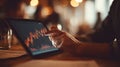 Person Using Tablet with Digital Chart for Business Analysis Royalty Free Stock Photo