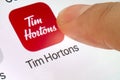 A person using the Tim Hortons application.