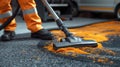 Person Using Vacuum Cleaner to Clean Street