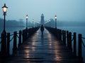 a person walking along a pier in the fog
