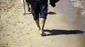 Person walking beach Royalty Free Stock Photo